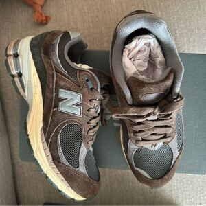 New Balance 2002R brown. 4.5 Mens fits 6.5 women’s.